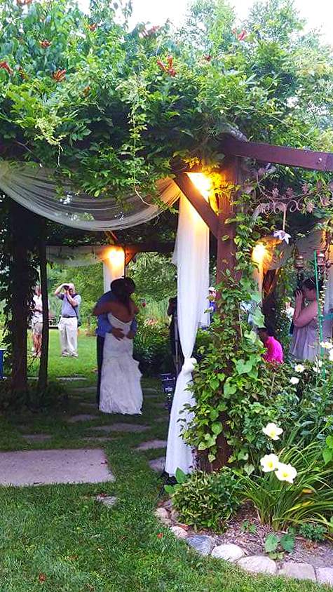 FIRST DANCE UNDER FLOWERING GAZEBO -- (Venue photo)